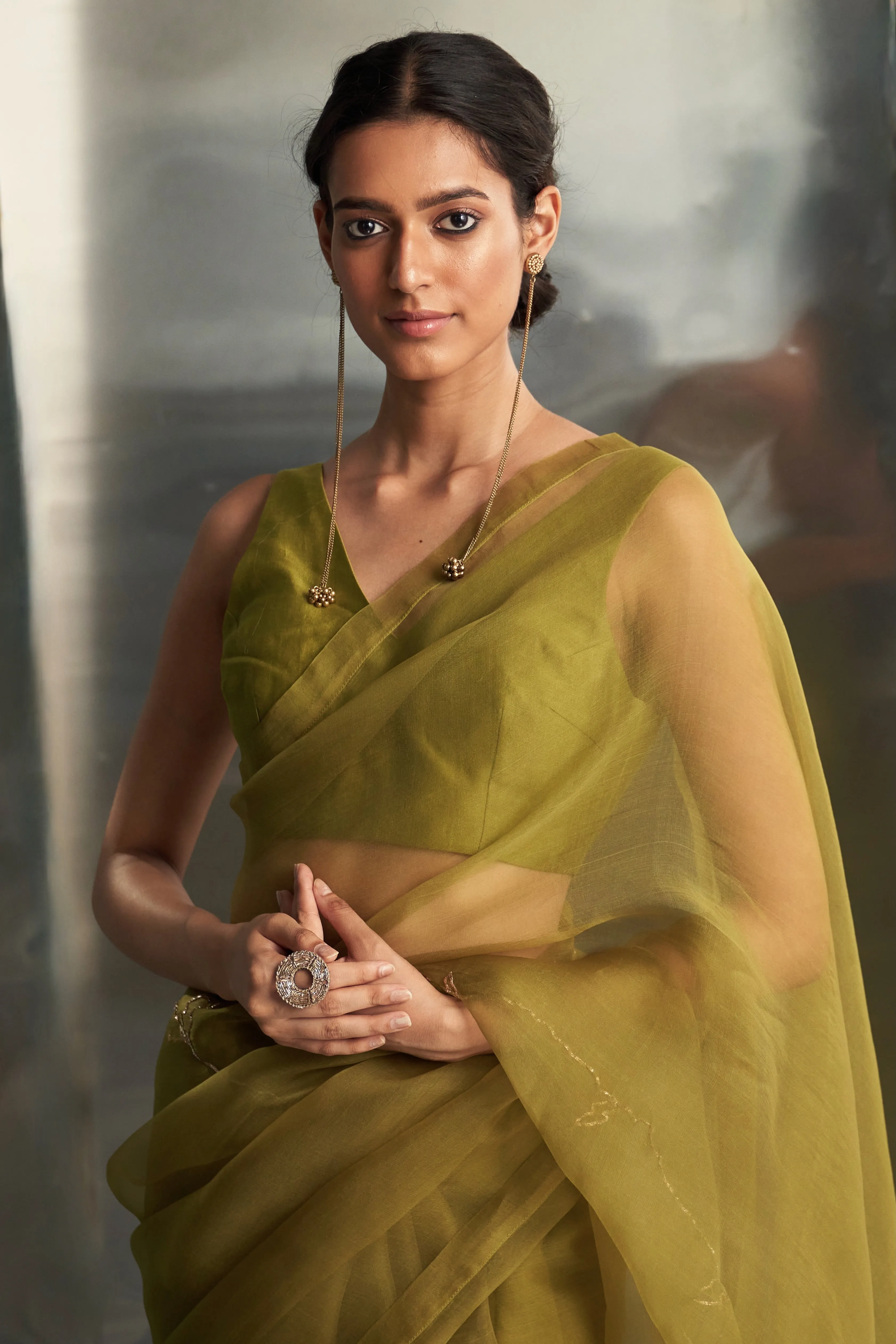 Berry Green Saree With Sleeveless Blouse